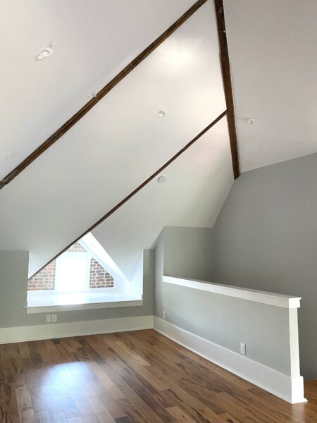 Madison Place Attic view half wall and window